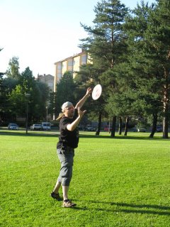 Miska playing frisbee